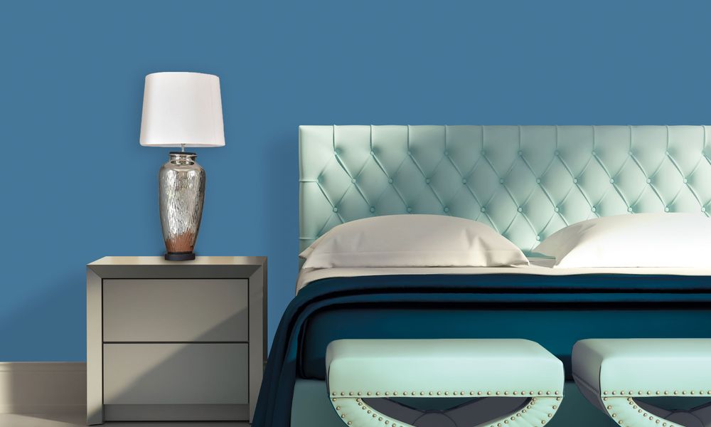 Contemporary elegant luxury bedroom with blue stools